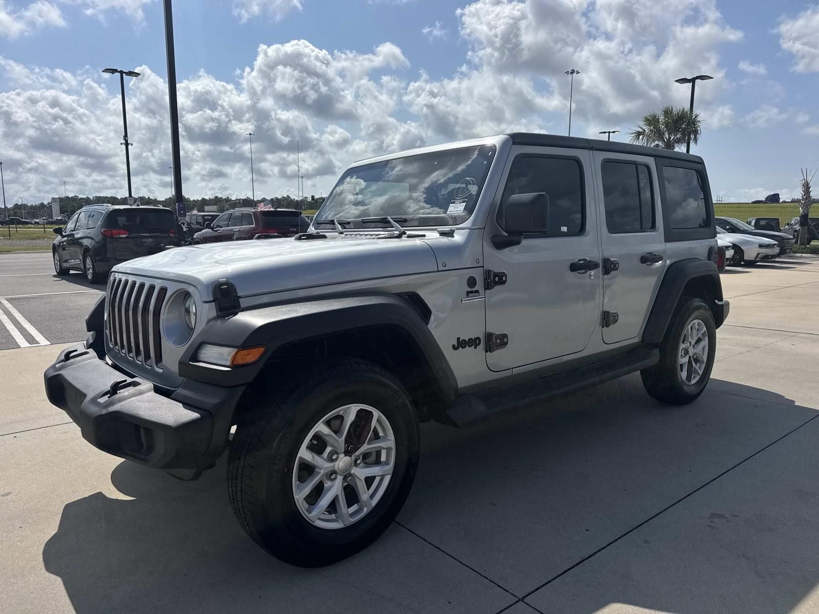 2023 Jeep Wrangler — rear three-quarter view