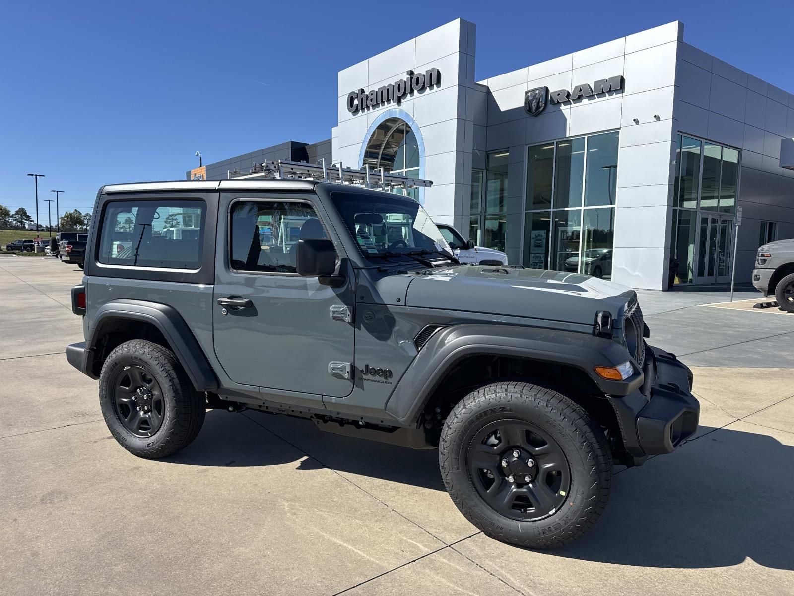 2026 Jeep Wrangler WRANGLER 2-DOOR SPORT in Anvil Clear-Coat Exterior Paint — front three-quarter view