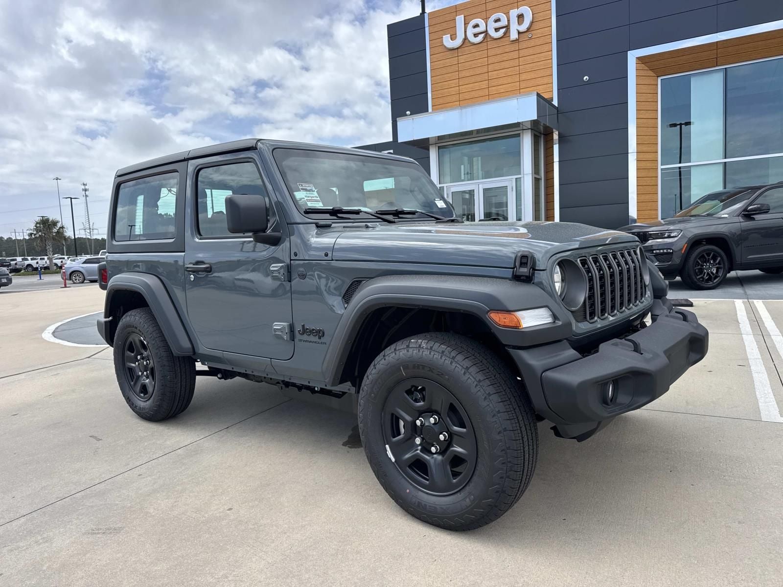 2026 Jeep Wrangler WRANGLER 2-DOOR SPORT in Anvil Clear-Coat Exterior Paint — front three-quarter view