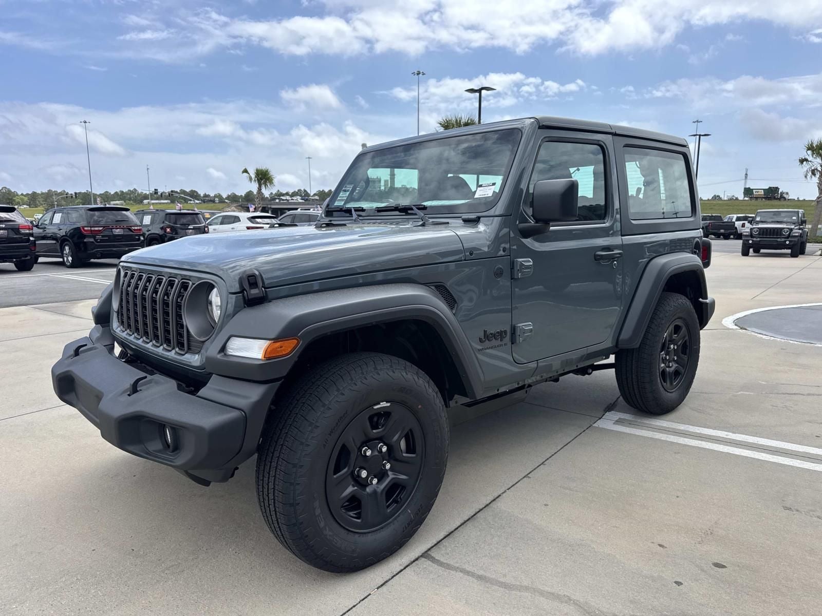 2026 Jeep Wrangler — rear three-quarter view