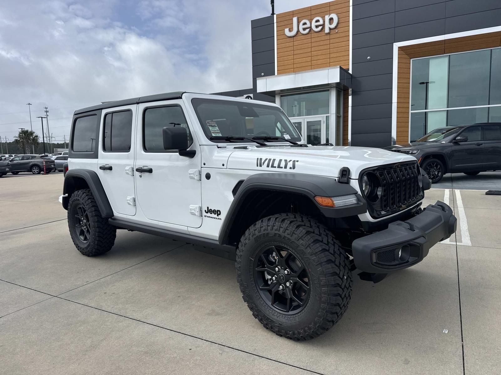2026 Jeep Wrangler WRANGLER 4-DOOR WILLYS in Bright White Clear-Coat Exterior Paint — front three-quarter view