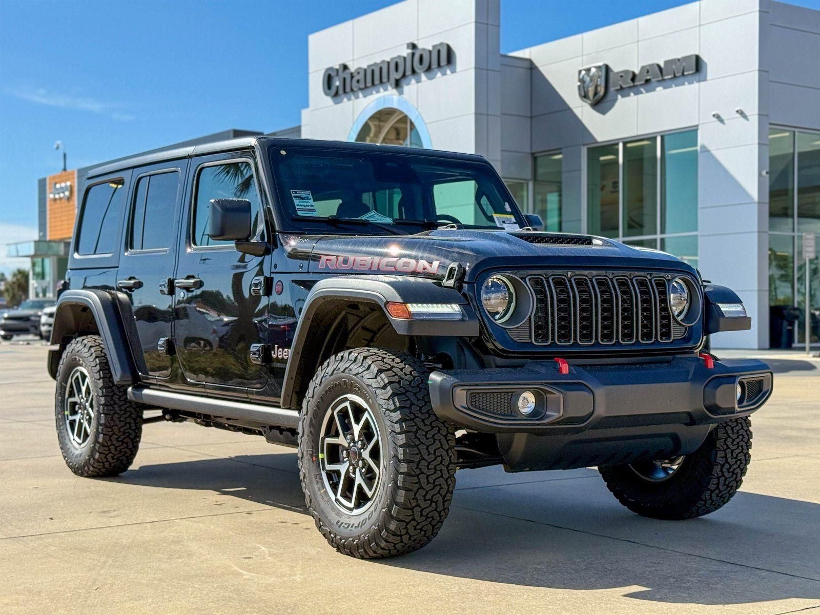 2026 Jeep Wrangler WRANGLER 4-DOOR RUBICON in Black Clear-Coat Exterior Paint — front three-quarter view