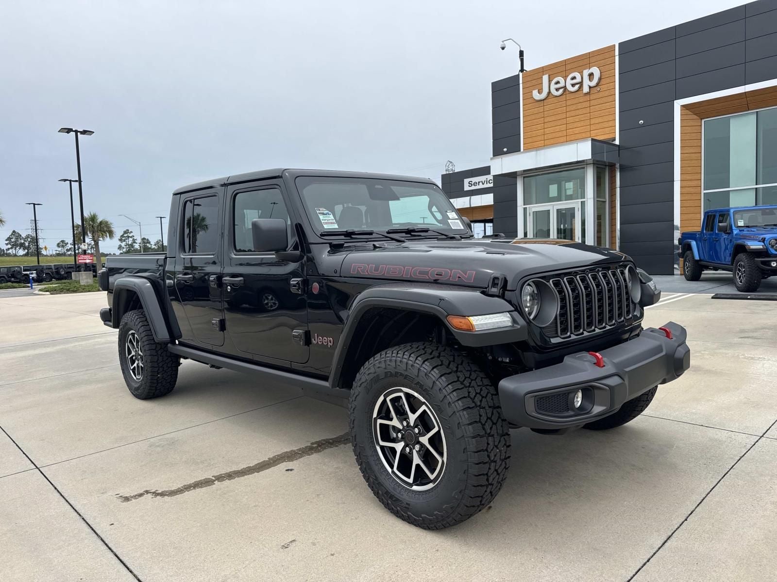 2026 Jeep Gladiator GLADIATOR RUBICON 4X4 in Black Clear-Coat Exterior Paint — front three-quarter view