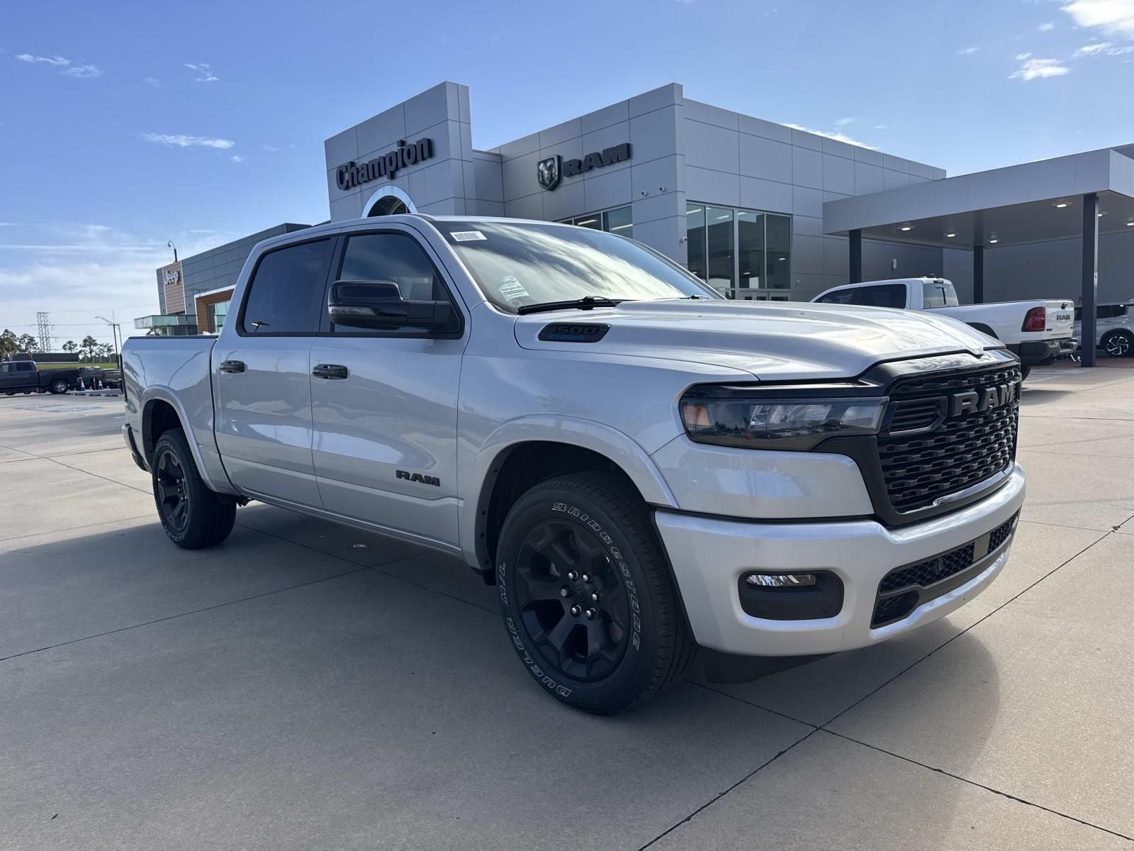 2026 RAM Ram 1500 RAM 1500 BIG HORN CREW CAB 4X2 5'7' BOX in Silver Zynith Exterior Paint — front three-quarter view