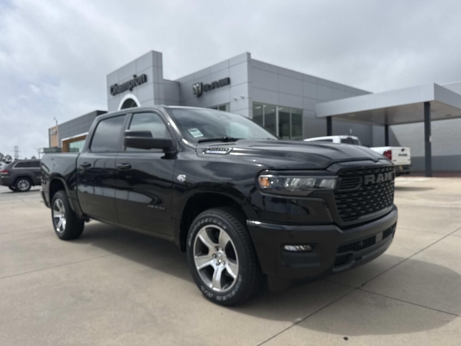 2026 RAM Ram 1500 RAM 1500 EXPRESS CREW CAB 4X2 5'7' BOX in Diamond Black Crystal Pearl-Coat Exterior Paint — front three-quarter view