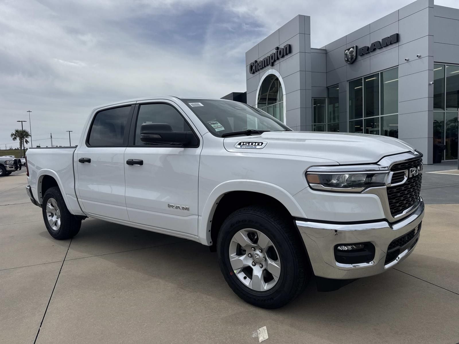 2026 RAM Ram 1500 RAM 1500 BIG HORN CREW CAB 4X4 5'7' BOX in Bright White Clear-Coat Exterior Paint — front three-quarter view