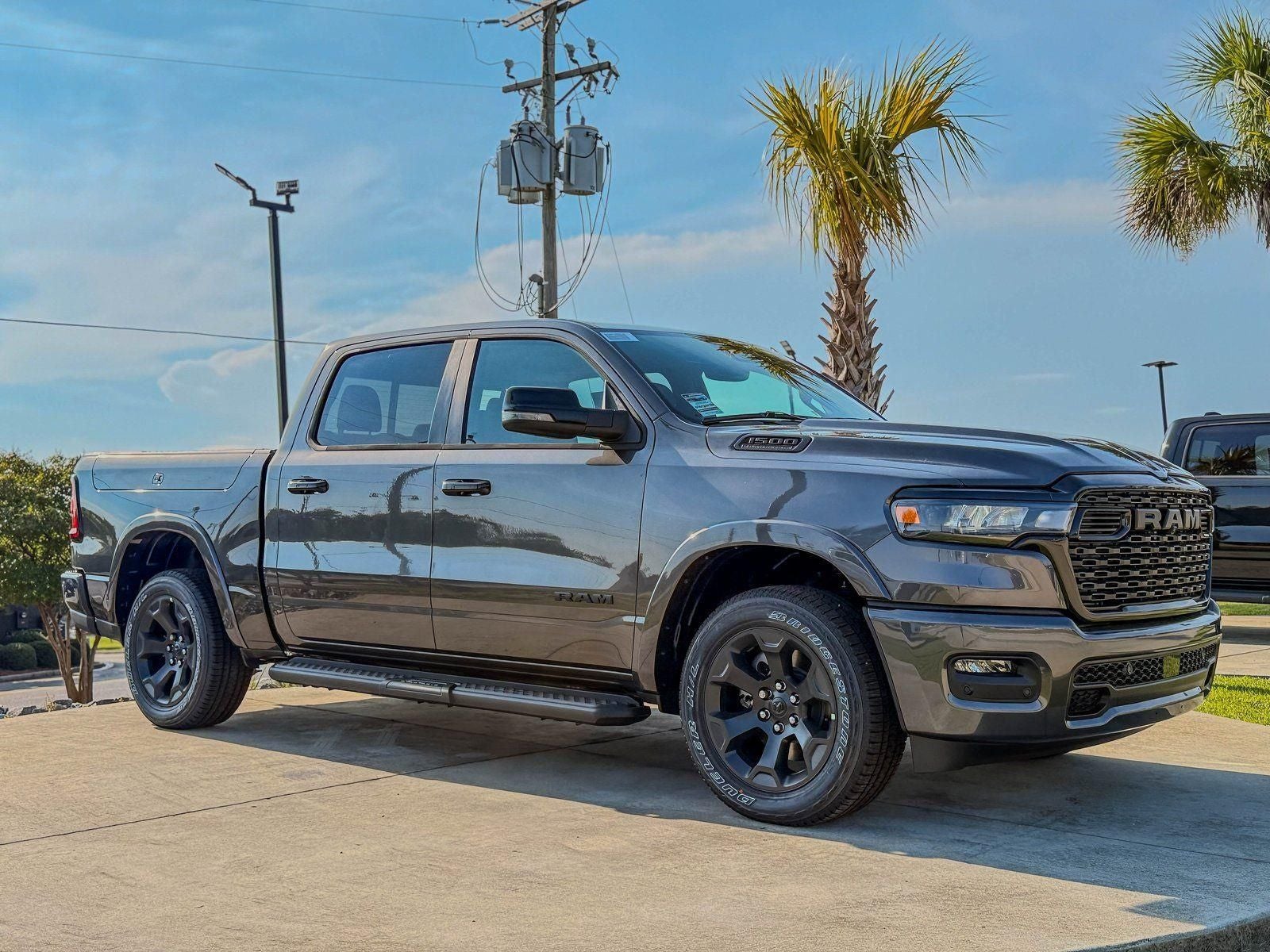 2026 RAM Ram 1500 RAM 1500 BIG HORN CREW CAB 4X4 5'7' BOX in Granite Crystal Metallic Clear-Coat Exterior Paint — front three-quarter view