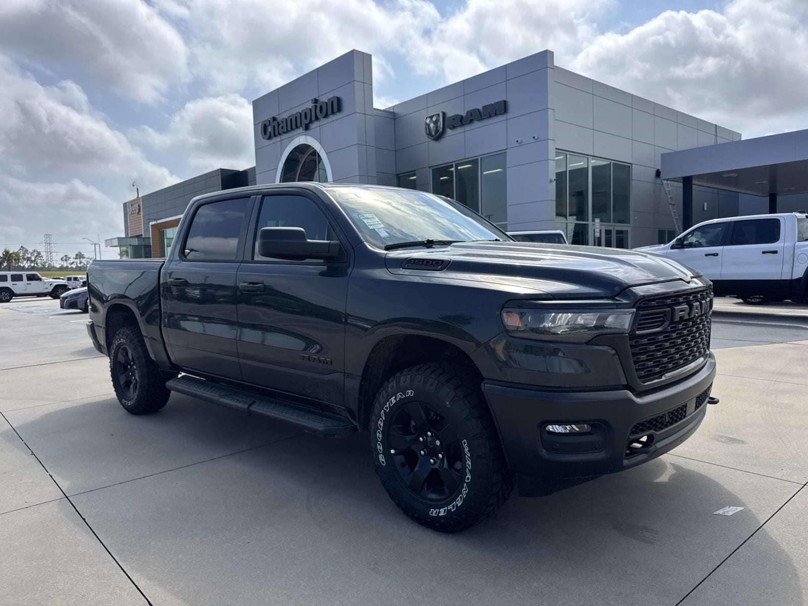 2026 RAM Ram 1500 RAM 1500 WARLOCK CREW CAB 4X4 5'7' BOX in Forged Blue Metallic Exterior Paint — front three-quarter view