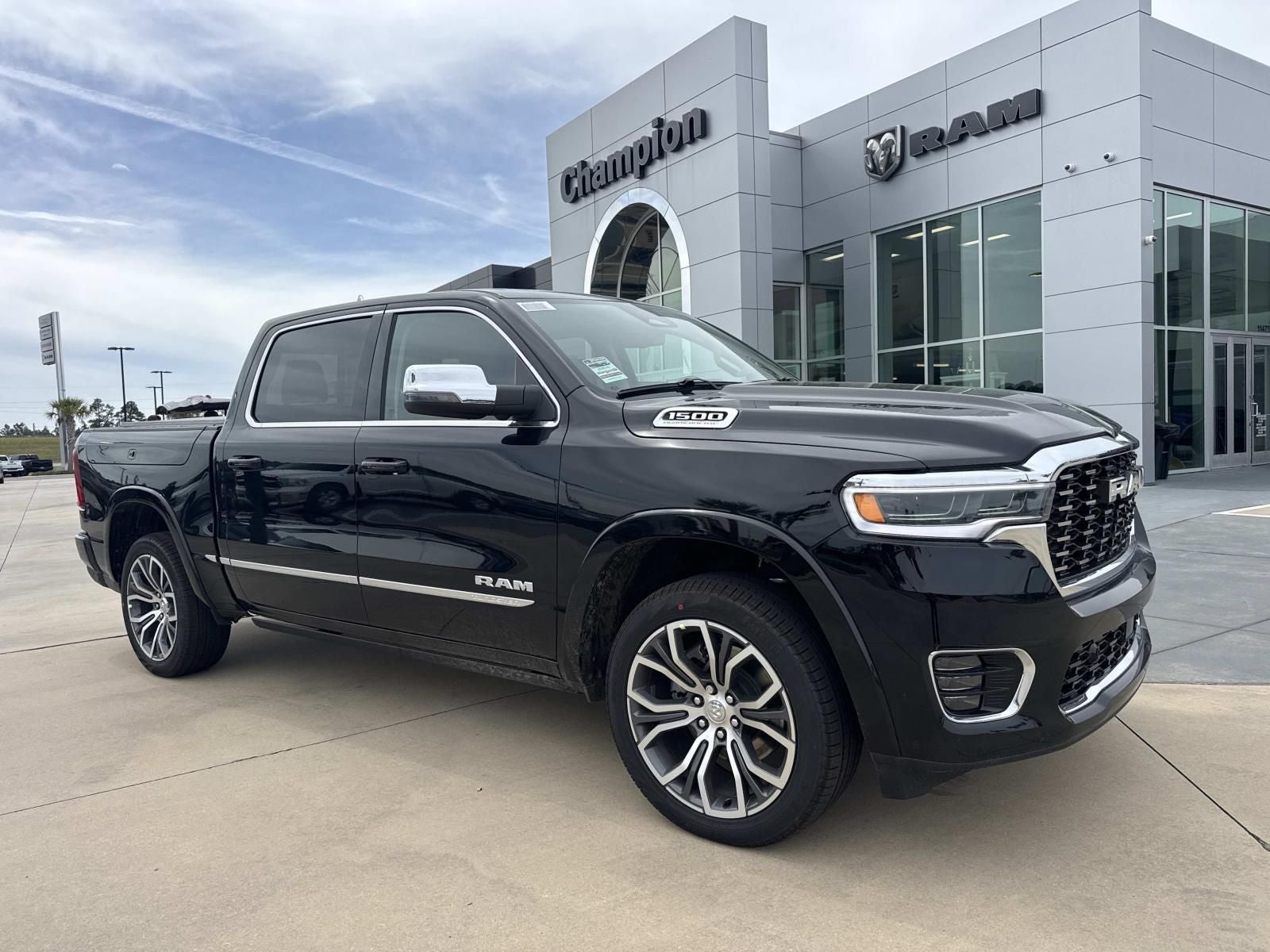 2026 RAM 1500 Tungsten in Diamond Black Crystal Pearlcoat — front three-quarter view