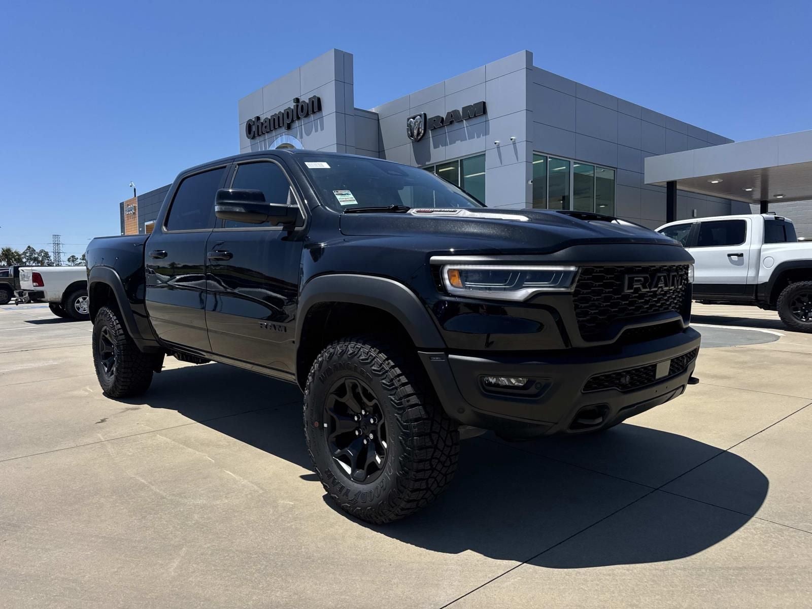2026 RAM 1500 RHO in Diamond Black Crystal Pearlcoat — front three-quarter view