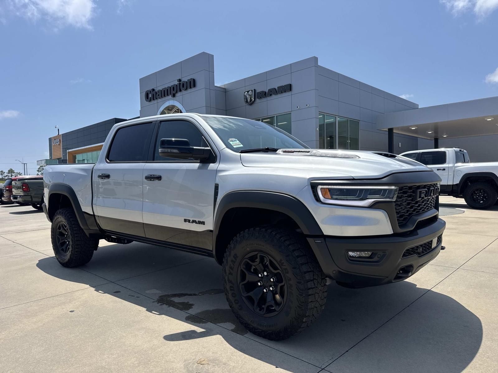 2026 RAM Ram 1500 RAM 1500 RHO CREW CAB 4X4 5'7' BOX in Silver Zynith Exterior Paint — front three-quarter view