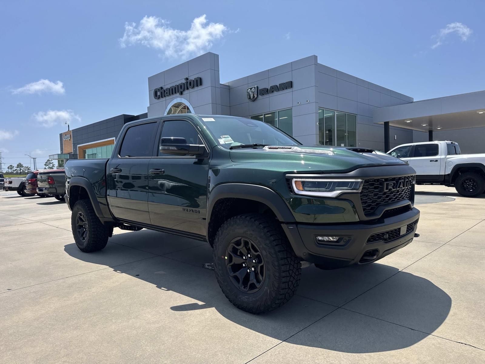 2026 RAM Ram 1500 RAM 1500 RHO CREW CAB 4X4 5'7' BOX in Serrano-Green Metallic Exterior Paint — front three-quarter view