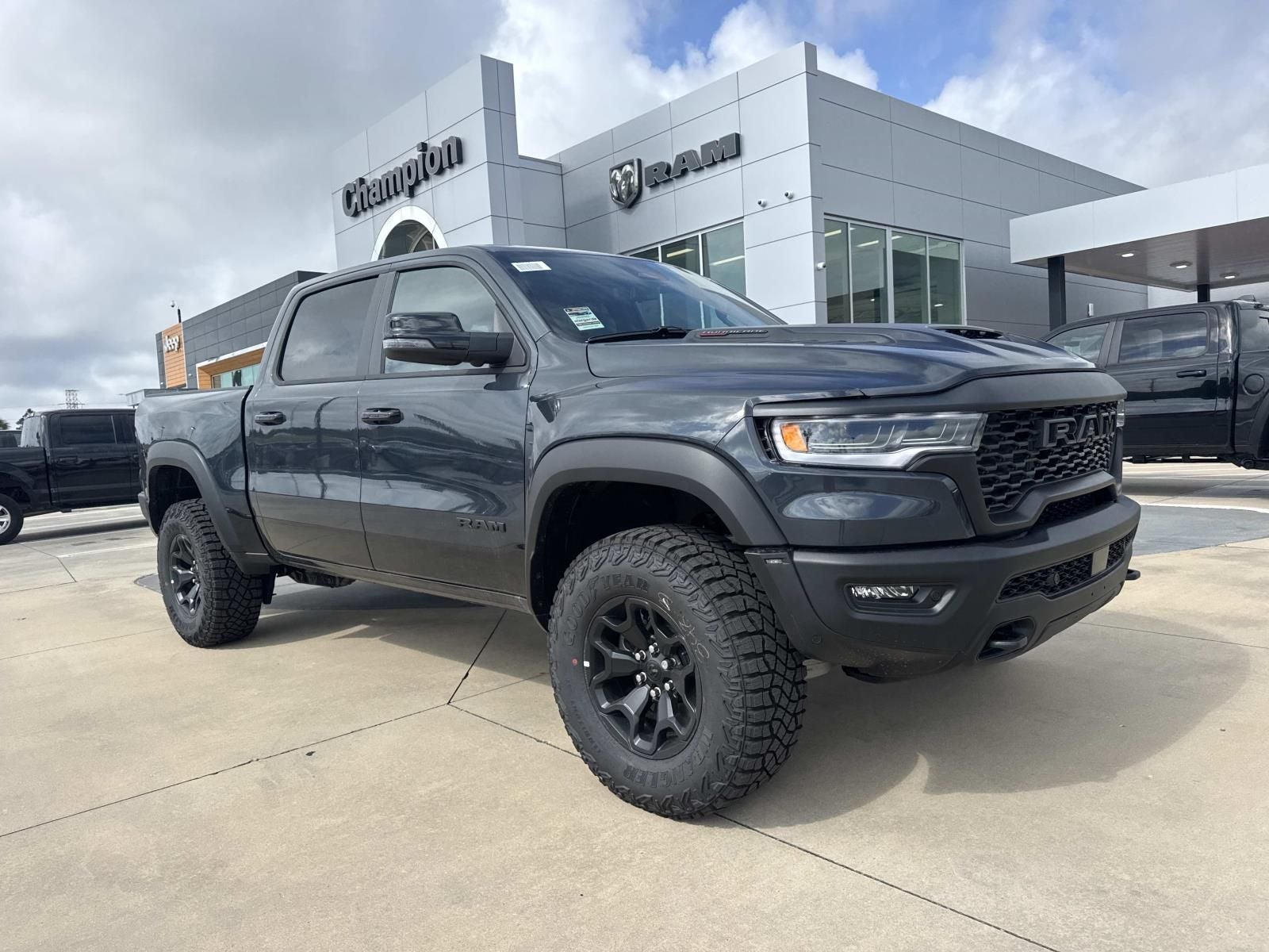 2026 RAM Ram 1500 RAM 1500 RHO CREW CAB 4X4 5'7' BOX in Forged Blue Metallic Exterior Paint — front three-quarter view