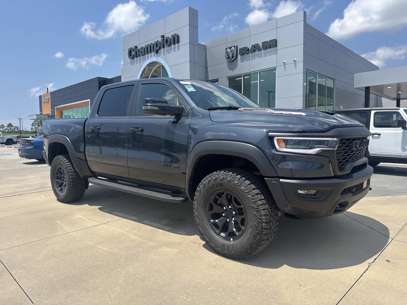 2026 RAM Ram 1500 RAM 1500 RHO CREW CAB 4X4 5'7' BOX in Forged Blue Metallic Exterior Paint — front three-quarter view
