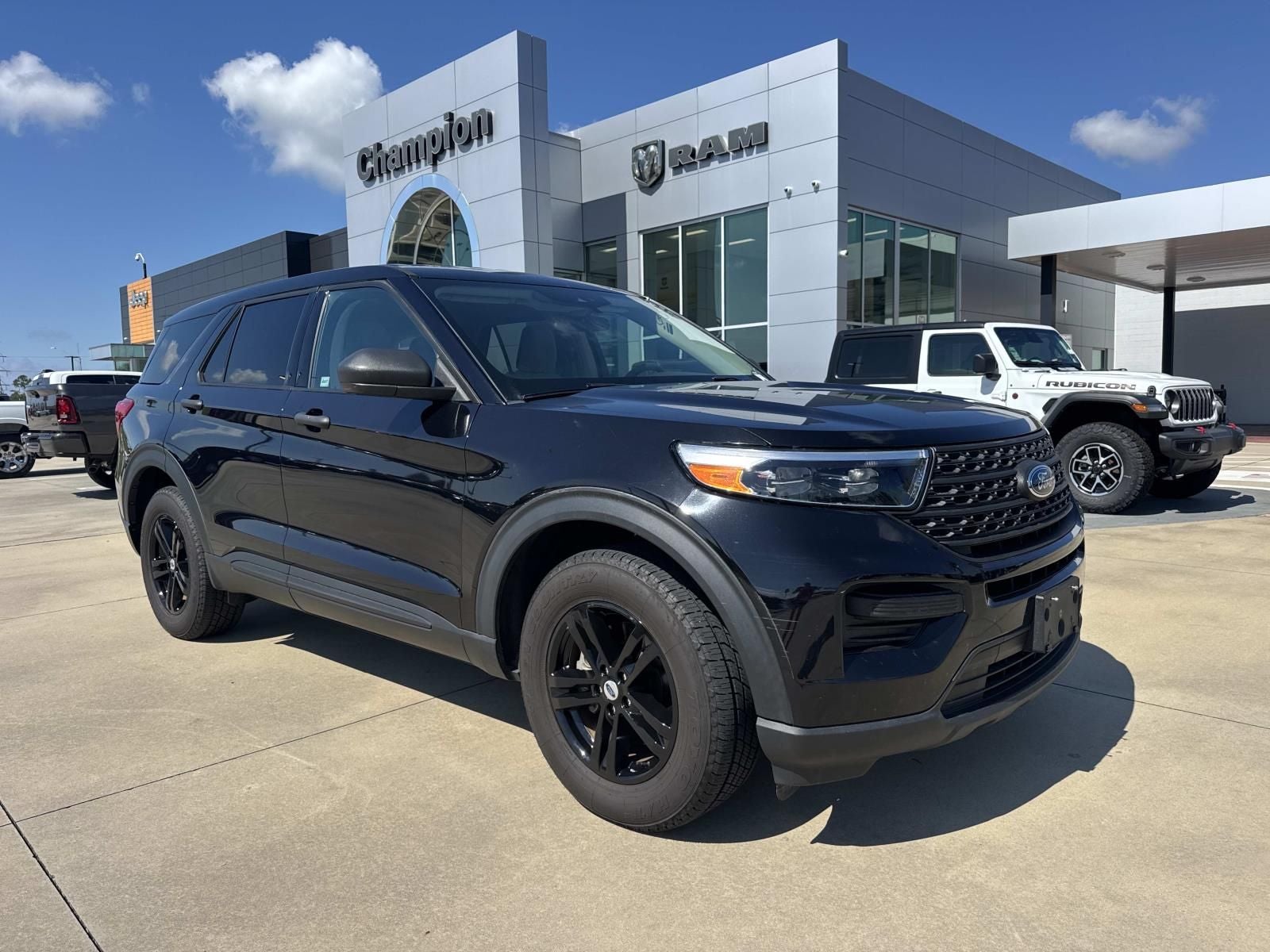 2023 Ford Explorer Base in Black Metallic — front three-quarter view