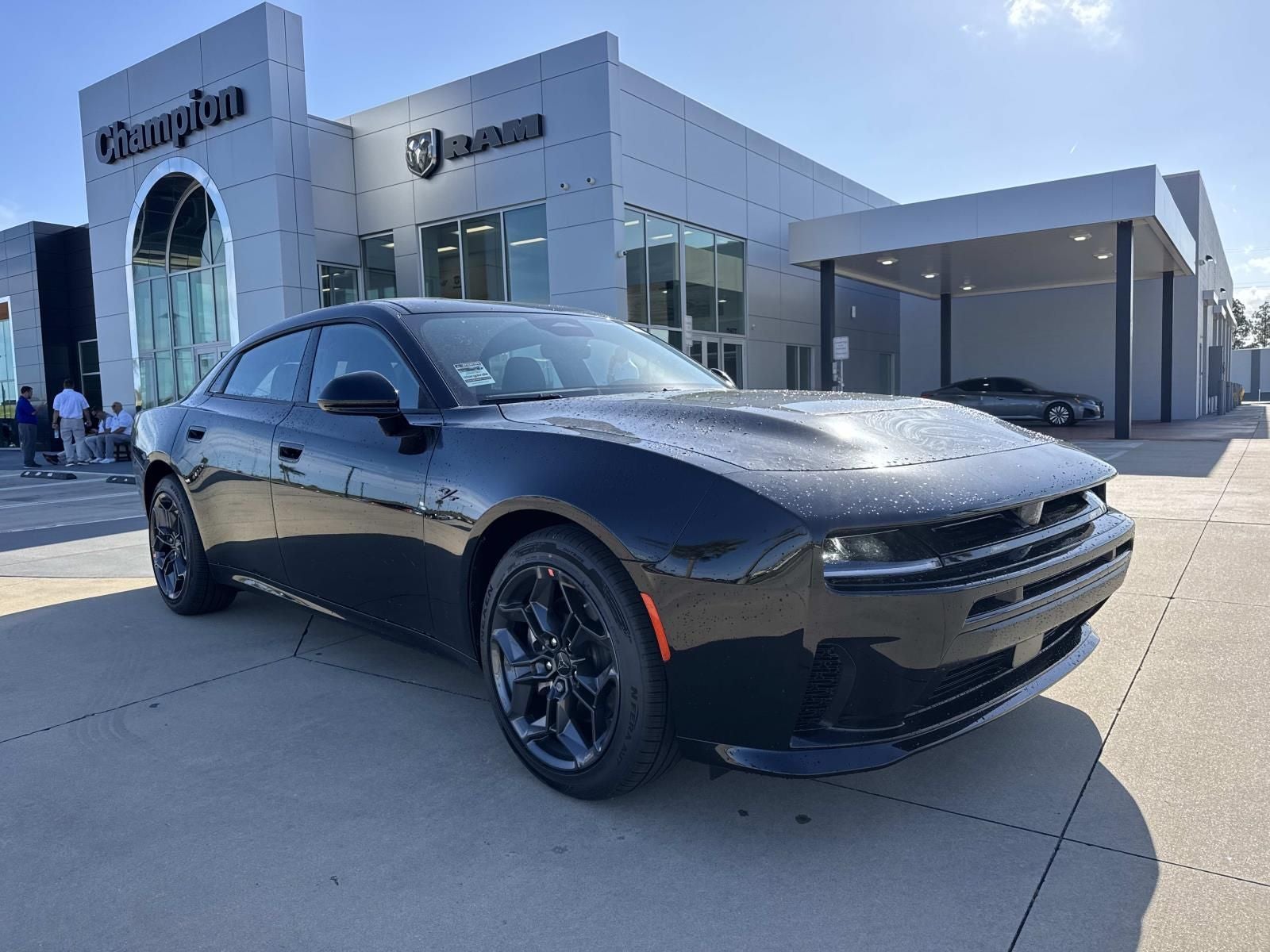 2026 Dodge Charger CHARGER R/T 4-DOOR AWD in Diamond Black Crystal Pearlcoat — front three-quarter view