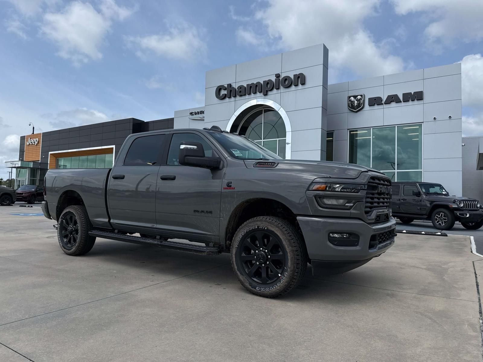 2026 RAM Ram 2500 RAM 2500 BIG HORN CREW CAB 4X4 6'4' BOX in Ceramic Gray Clear-Coat Exterior Paint — front three-quarter view