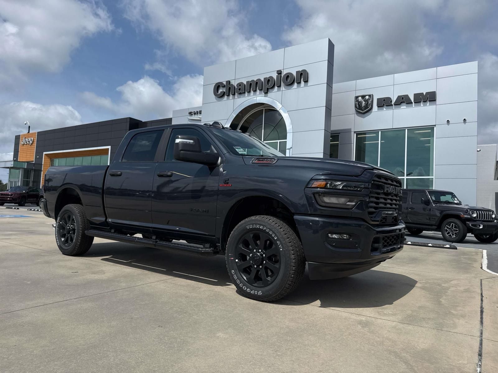 2026 RAM Ram 2500 RAM 2500 BIG HORN CREW CAB 4X4 6'4' BOX in Forged Blue Metallic Exterior Paint — front three-quarter view