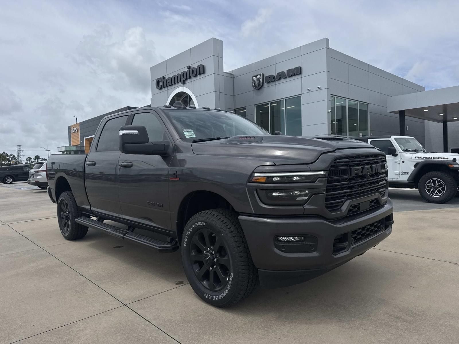2026 RAM Ram 2500 RAM 2500 LARAMIE CREW CAB 4X4 6'4' BOX in Granite Crystal Metallic Clear-Coat Exterior Paint — front three-quarter view
