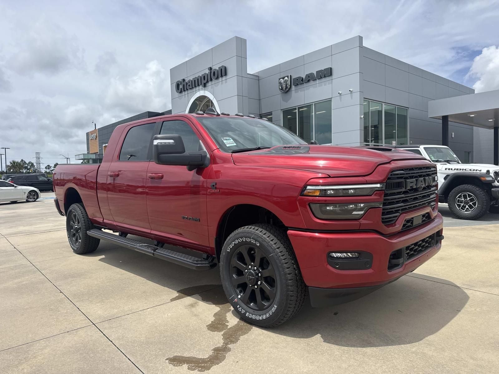 2026 RAM Ram 2500 RAM 2500 LARAMIE MEGA CAB 4X4 6'4' BOX in Molten Red Pearl-Coat Exterior Paint — front three-quarter view
