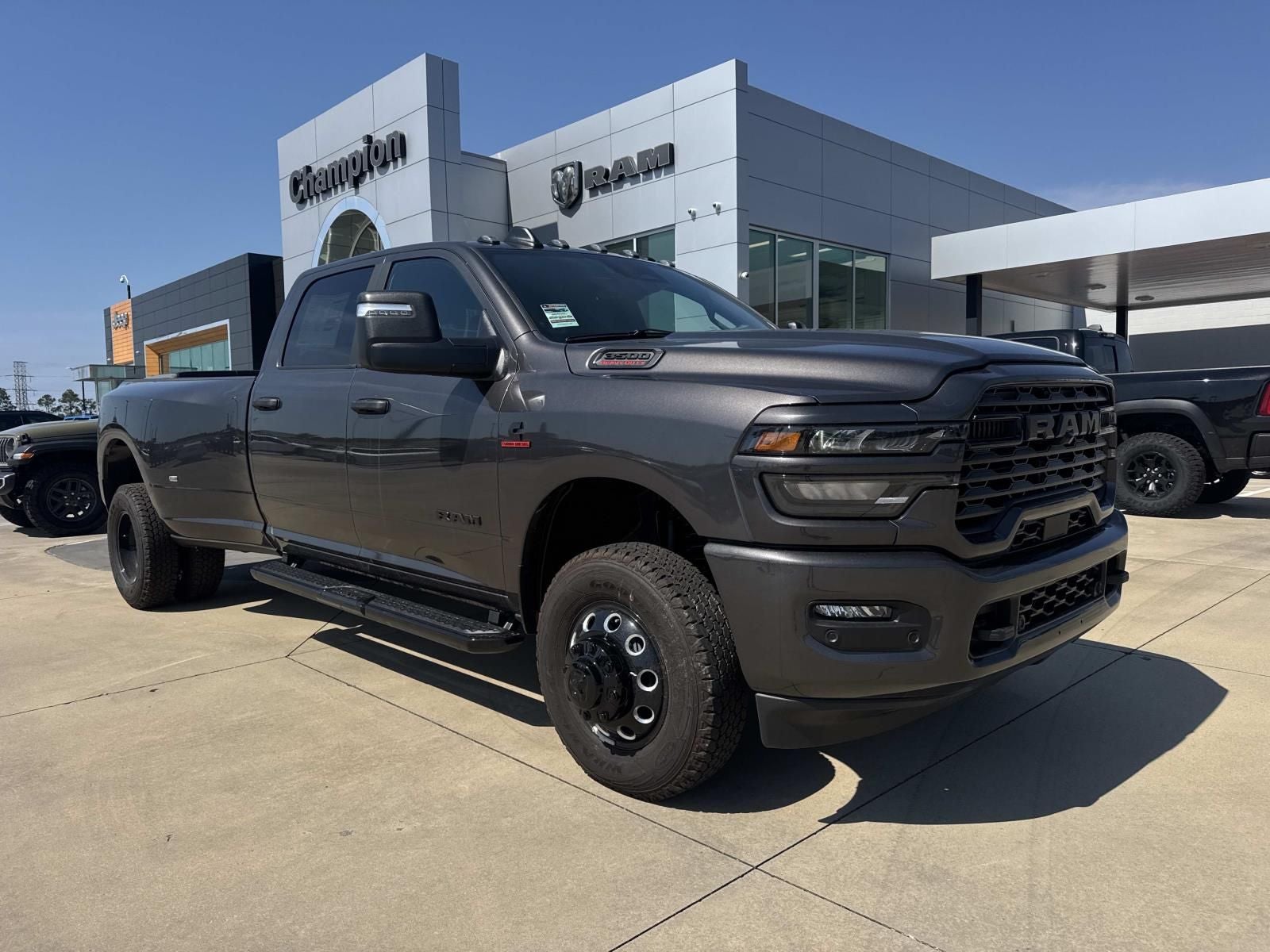 2026 RAM Ram 3500 RAM 3500 BIG HORN CREW CAB 4X4 8' BOX in Granite Crystal Metallic Clear-Coat Exterior Paint — front three-quarter view