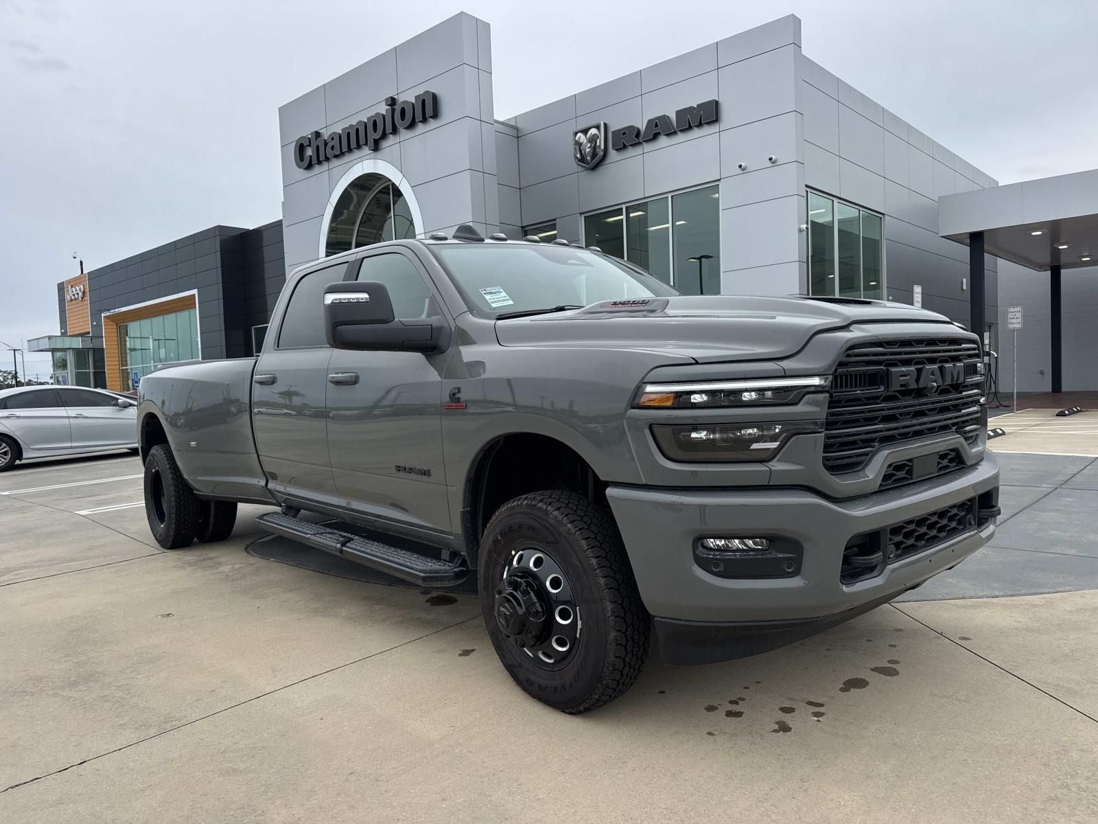 2026 RAM Ram 3500 RAM 3500 LARAMIE CREW CAB 4X4 8' BOX in Ceramic Gray Clear-Coat Exterior Paint — front three-quarter view