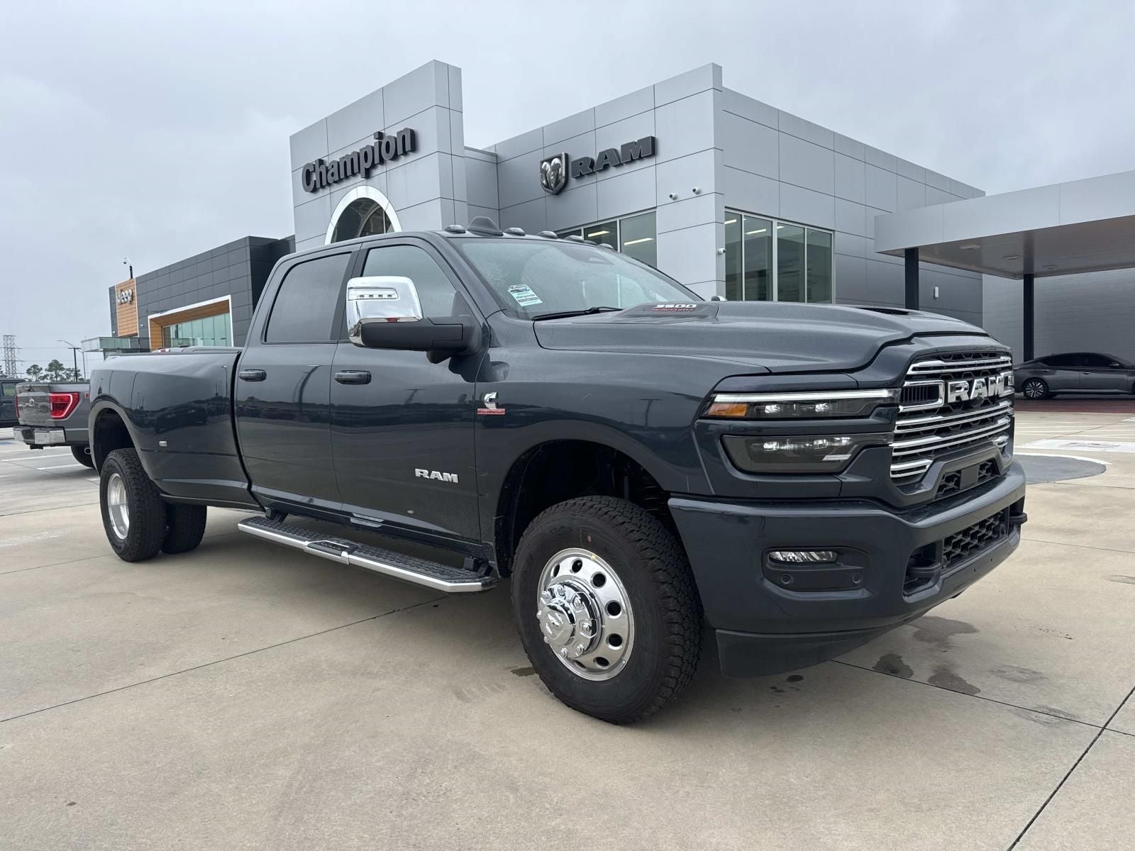 2026 RAM Ram 3500 RAM 3500 LARAMIE CREW CAB 4X4 8' BOX in Forged Blue Metallic Exterior Paint — front three-quarter view