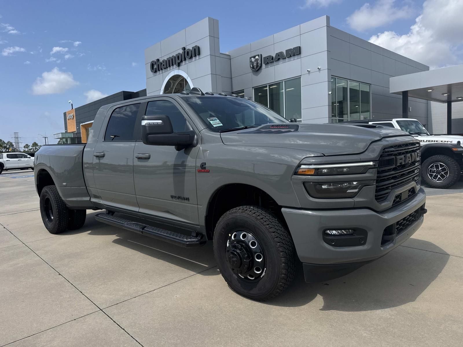 2026 RAM Ram 3500 RAM 3500 LARAMIE MEGA CAB 4X4 6'4' BOX in Ceramic Gray Clear-Coat Exterior Paint — front three-quarter view