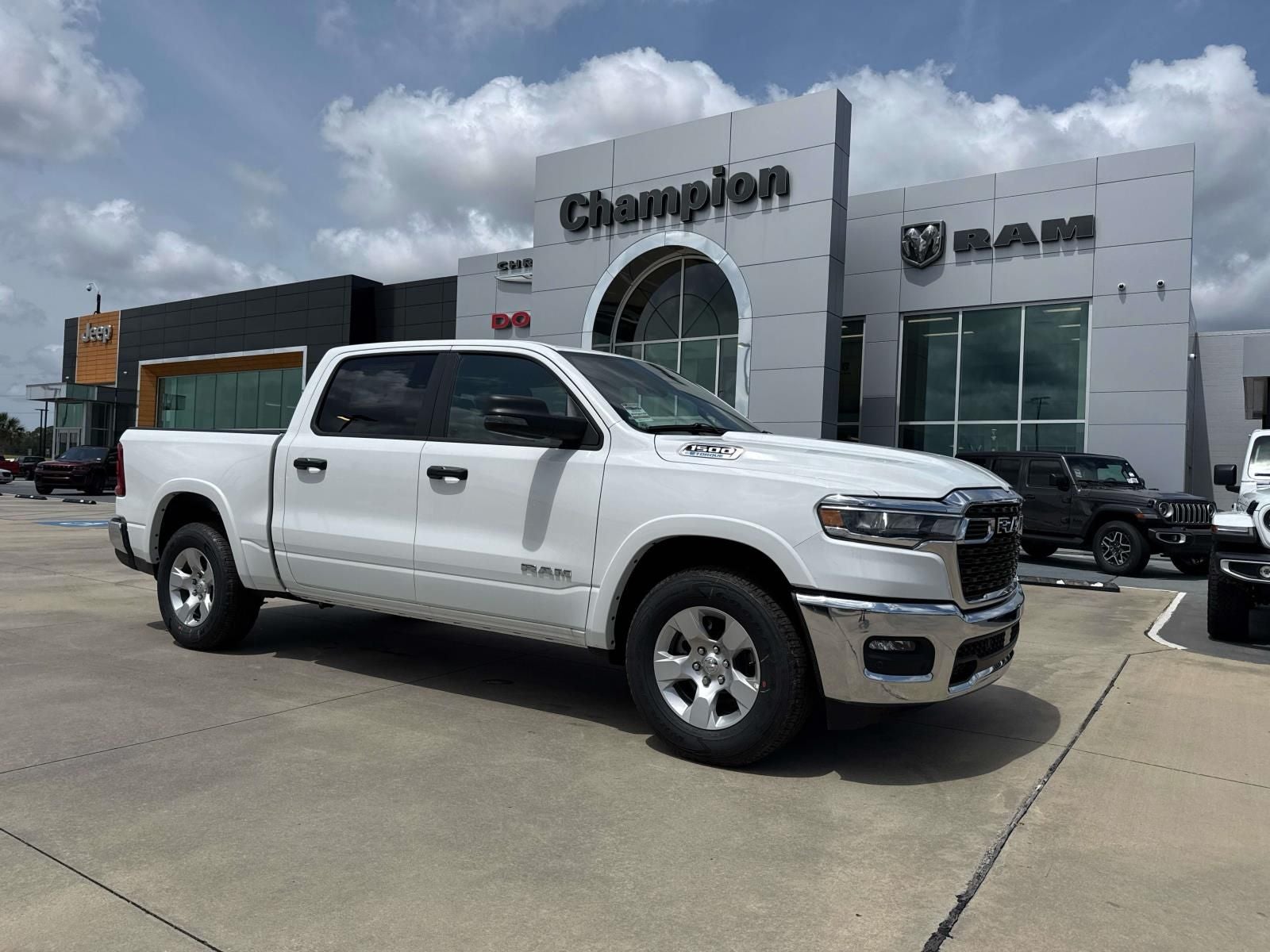 2026 RAM Ram 1500 RAM 1500 BIG HORN CREW CAB 4X2 5'7' BOX in Bright White Clear-Coat Exterior Paint — front three-quarter view