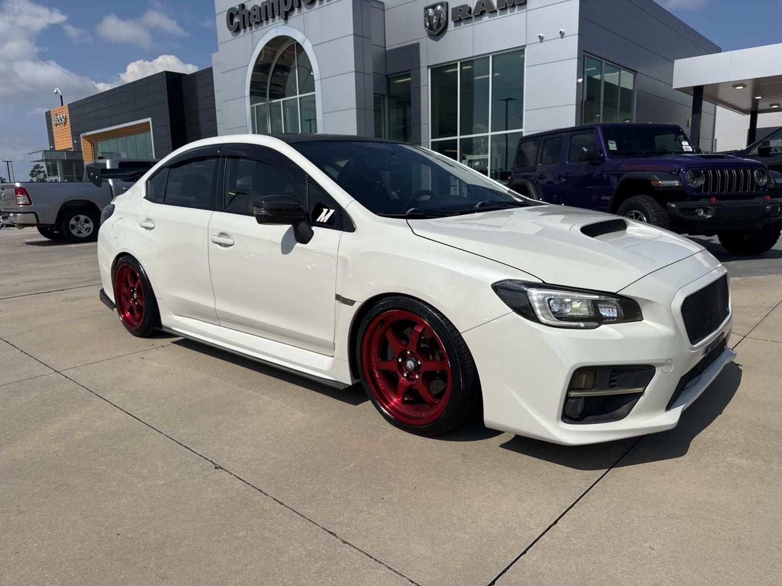 2016 Subaru WRX Limited in Crystal White Pearl — front three-quarter view